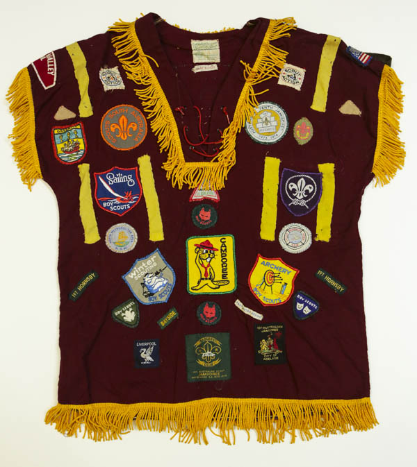 Scout uniform with badges.