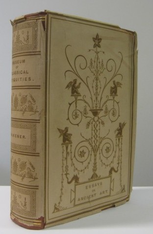 The Museum of classical antiquities : being a series of essays on ancient art / edited by Edward Falkener. New ed. (London : Longman, Green, Longman, and Roberts, 1860). The earliest known example of a dust wrapper is on a copy of Friendship's Offering 1830 (1829).The earliest in our collection is from 1860, a survival from the period when the wrapper extended around the text block to keep the dust from the gilt edges. It has a simple design, based on that used on the cloth cover. Such wrappers were not meant to be retained once the book was bought. The paper is very thin and easily damaged. 