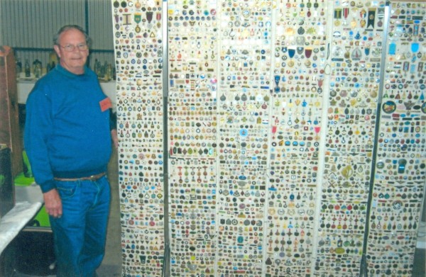 Bill and part of his badge collection.
