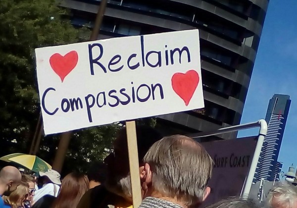 'Reclaim Compassion', part of a series of signs with red hearts - double sided, 2015.