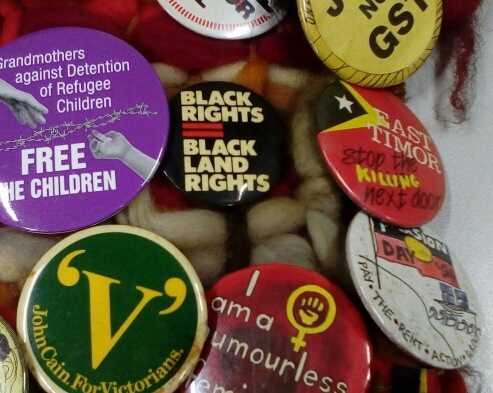 political badges, black land rights, mon 2015